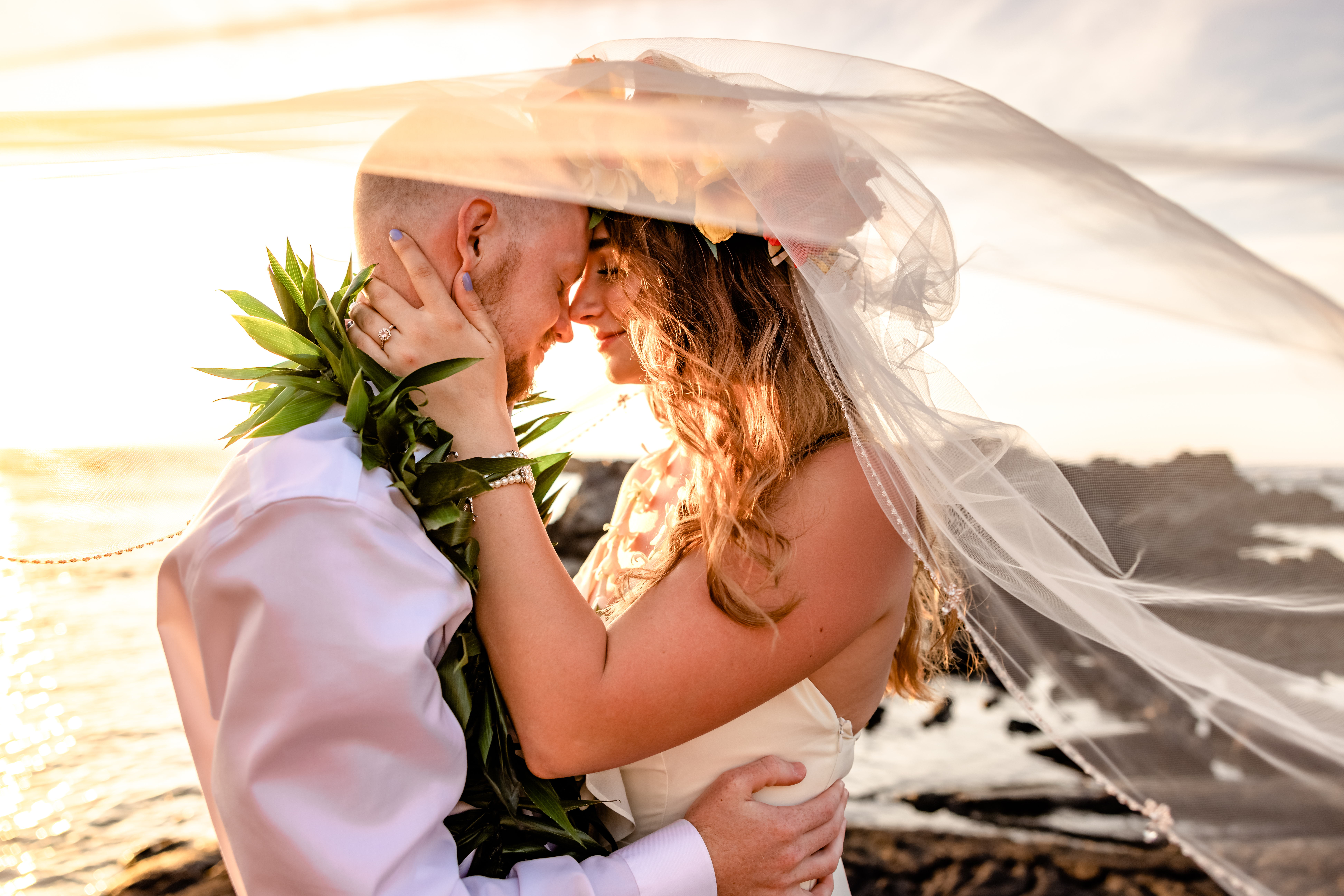Bride and groom at sunset after Hawaii elopement