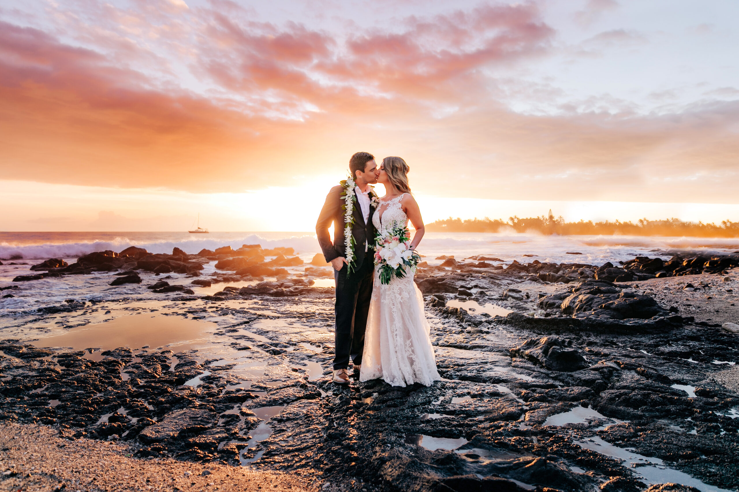 Couple on lava at sunset after their Big Island elopement